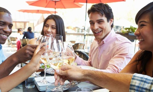 a group of people eating at a table