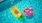 people on floaties in a pool