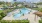 aerial shot of gated pool surrounded by lounge chairs