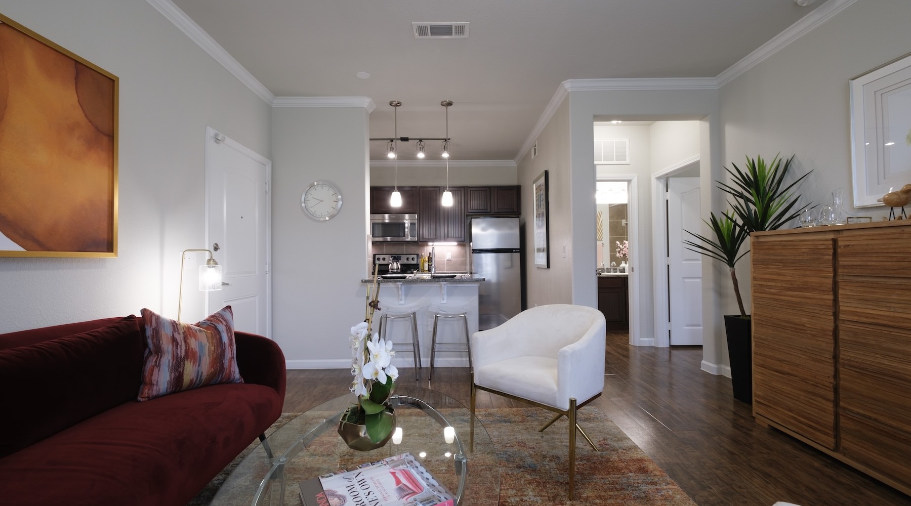 living room with couch coffee table and chair