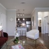 living room with couch coffee table and chair