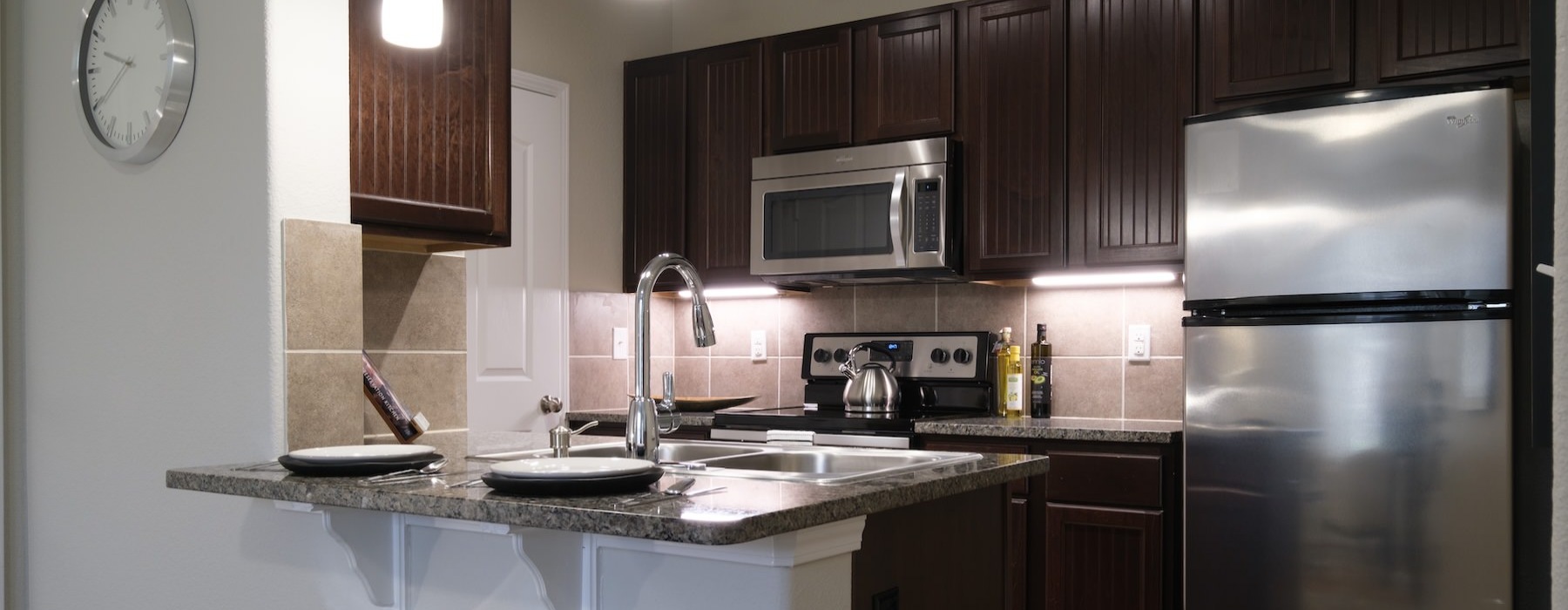 kitchen with dark cabinets