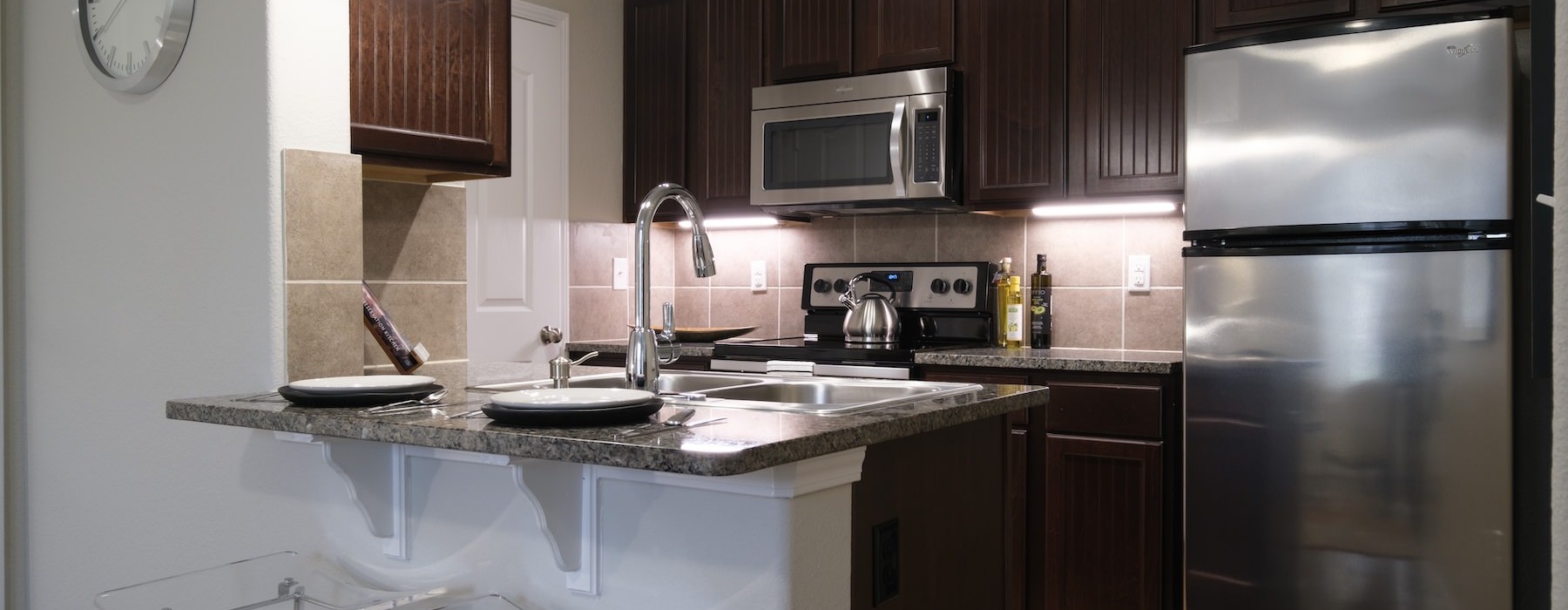 kitchen with dark cabinets
